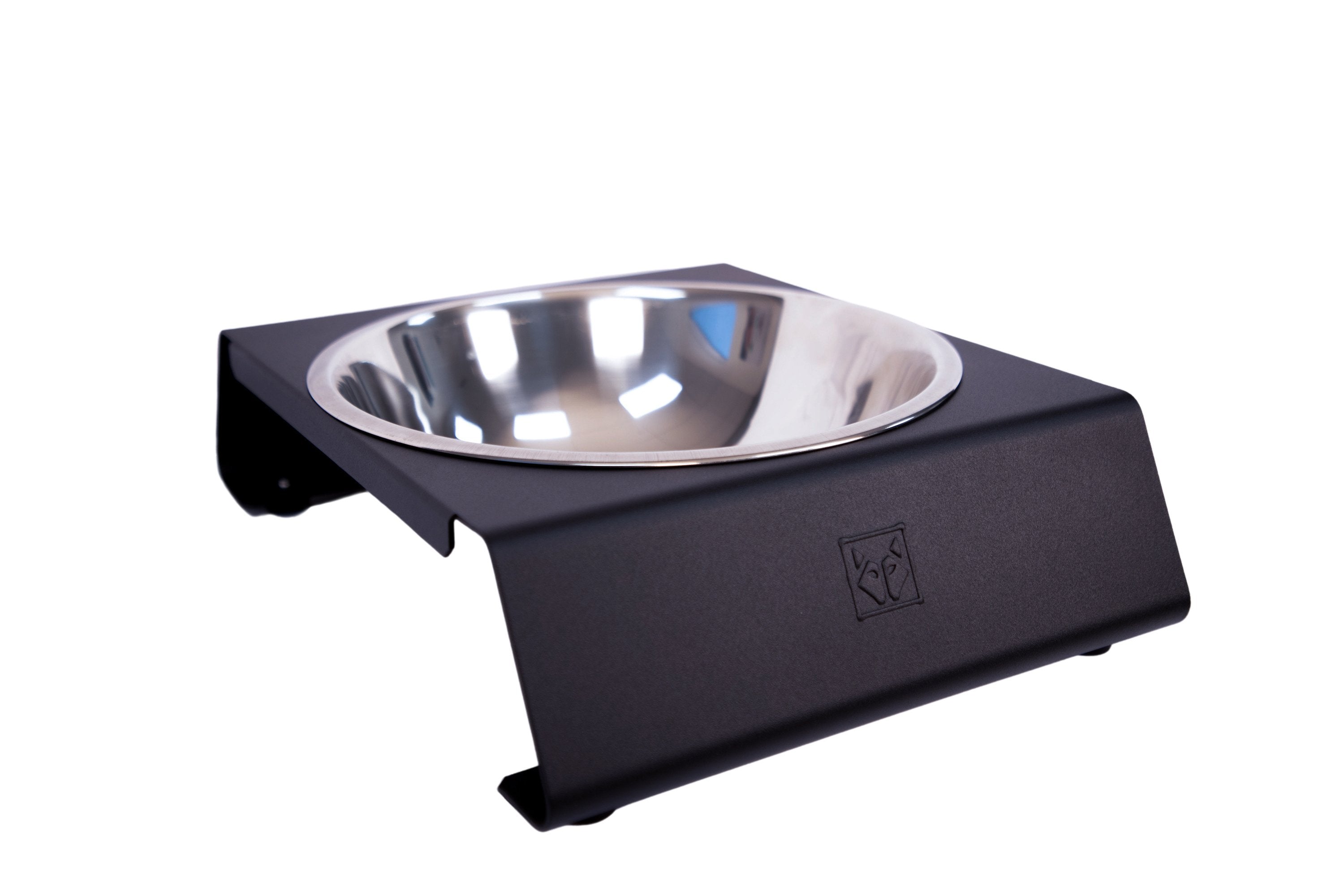 angle view of single aluminum black dog bowl stand with stainless steel bowl from impact dog crates
